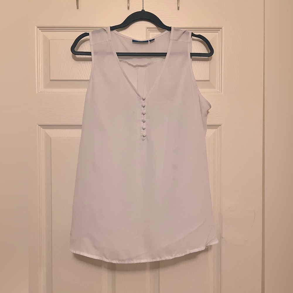 White sleeveless top